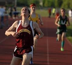 Evan Prizy kicks runs solid 4:32 on a 160m track/Daily Herald image