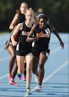 St. Charles East boss their way to IL#1 3:58.73 4x4r win/Daily Herald image